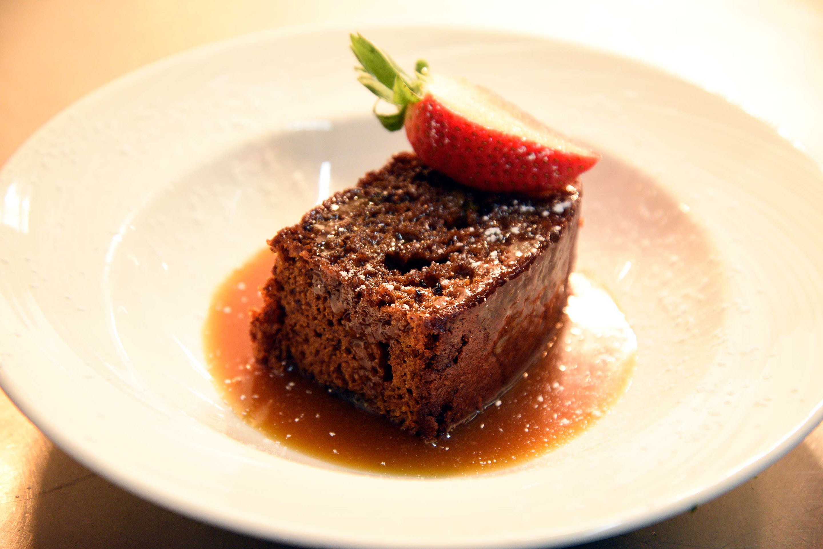 Enjoy sticky toffee pudding at Sea Breezes restaurant in Portree with sea views