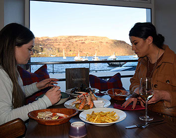 Sea Breezes Restaurant is based on Portree Pier and offers diners stunning Isle of Skye Sea views.